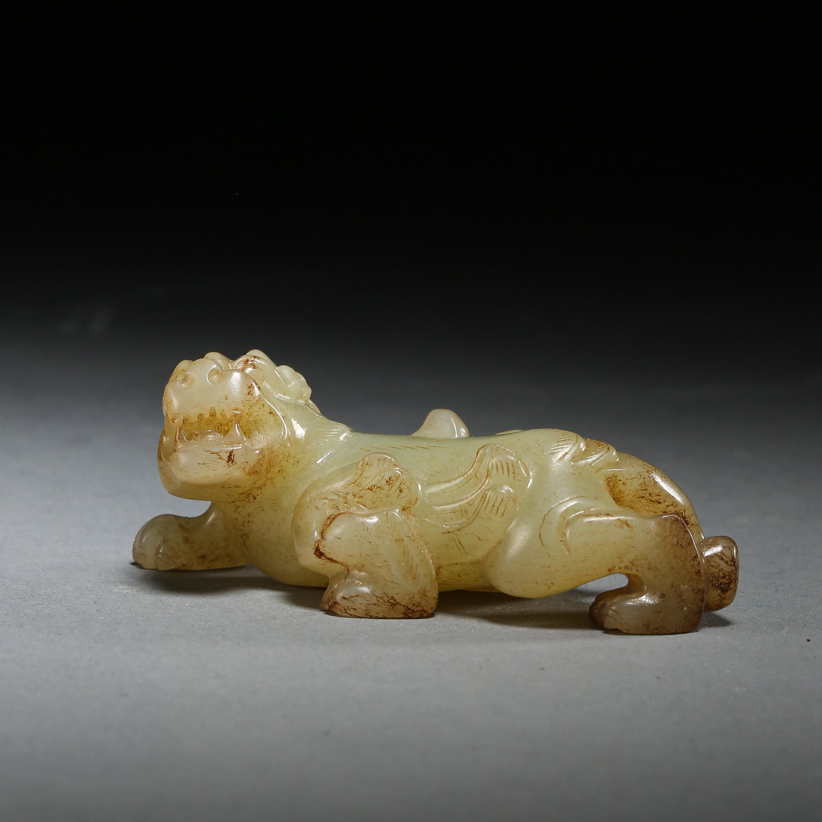 HAN DYNASTY, CHINESE HETIAN JADE BEAST: HAN DYNASTY, CHINESE HETIAN JADE BEAST H. 2.7 cm. L. 6.5 cm. Weight 38 gram.