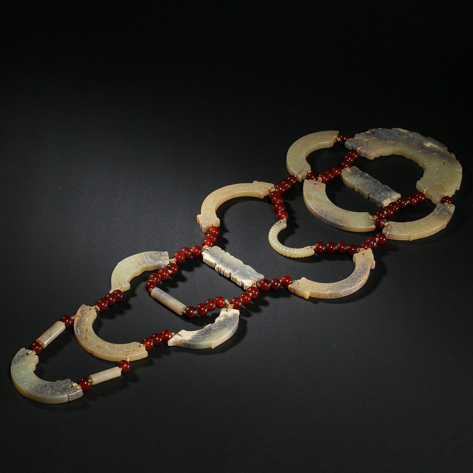 A SET OF HETIAN JADE, ZHAN HAN DYNASTIES, CHINA (1 of 17)