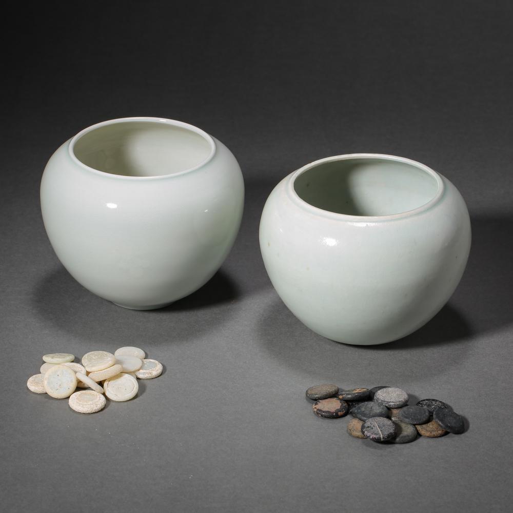 A PAIR OF HUTIAN WARE CELADON GLAZE GO CHESS JARS, (1 of 13)