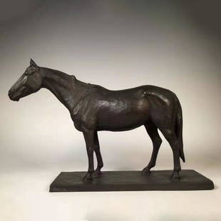 A BRONZE-CAST HORSE DESK ORNAMENT IN THE PERIOD OF THE REPUBLIC OF CHINA: A BRONZE-CAST HORSE DESK ORNAMENT IN THE PERIOD OF THE REPUBLIC OF CHINA H. 28 cm. W. 34 cm. Weight 5700 gram.