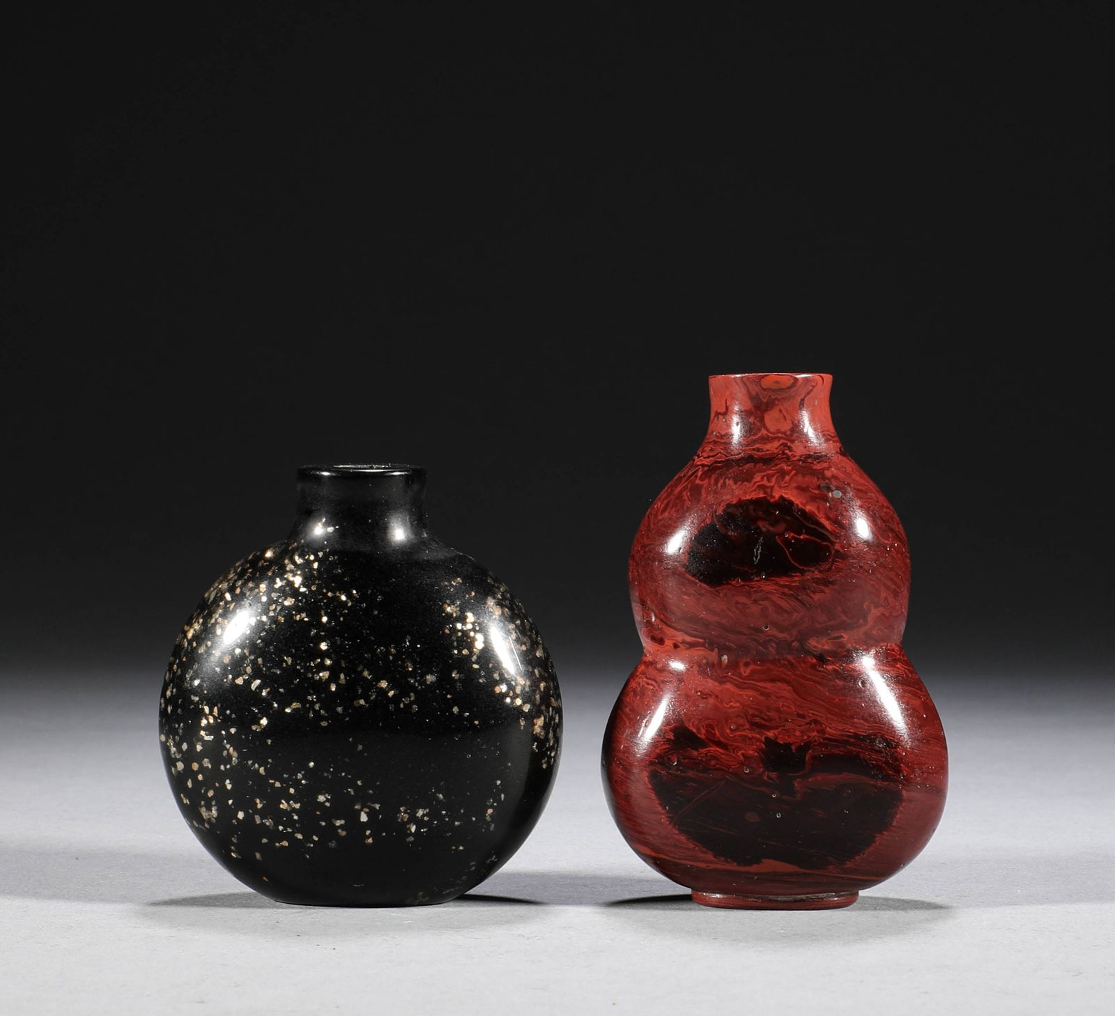 A set of Chinese Qing Dynasty lacquer snuff bottles (1 of 5)