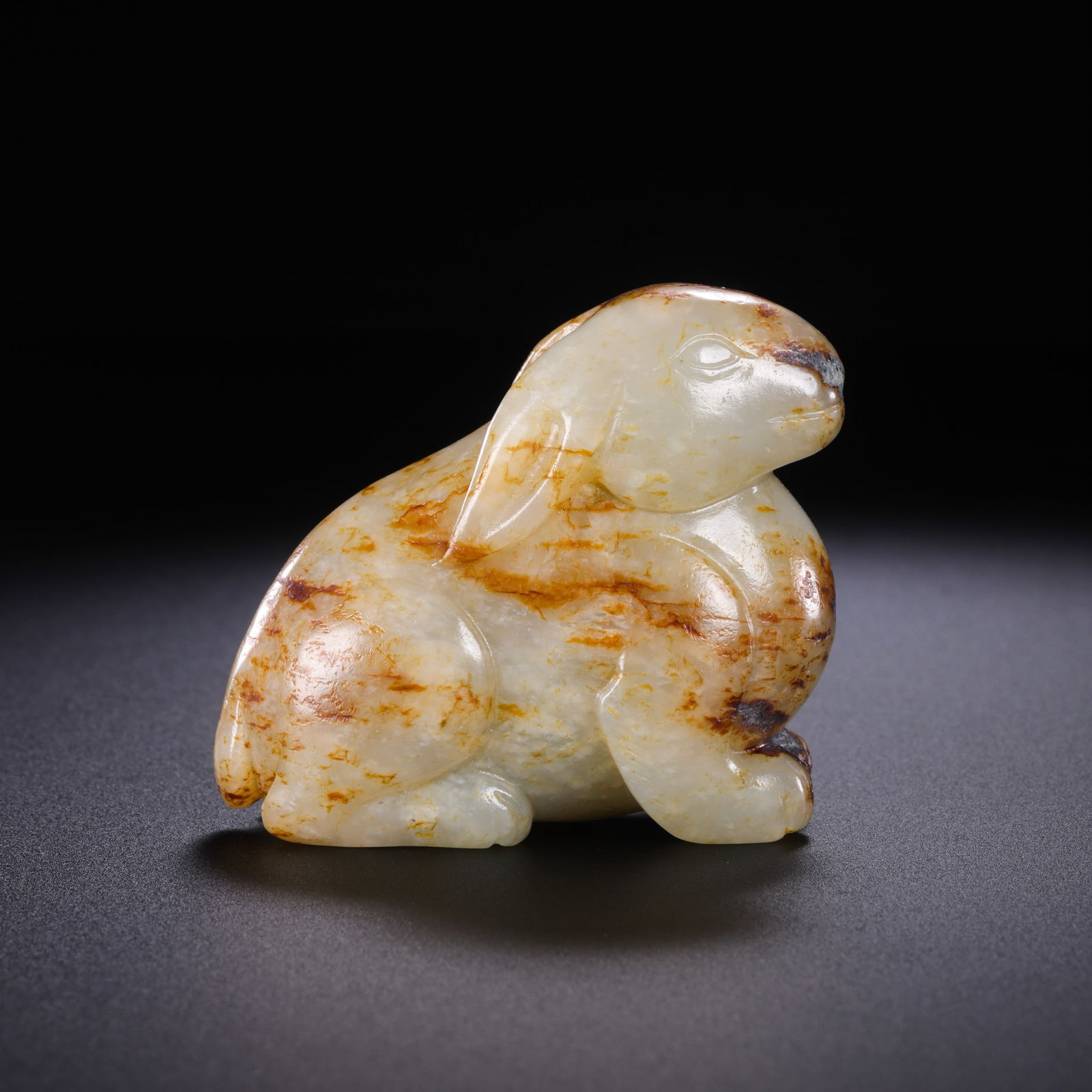 China Ming Dynasty Hetian white jade red infiltration rabbit (1 of 7)
