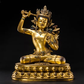 Gilt-bronze Buddha statue from the Qing Dynasty of China with turquoise inlay
