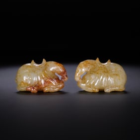 A pair of Chinese Han Dynasty jade lying horses