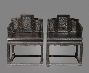 A pair of Chinese Qing Dynasty rosewood chairs