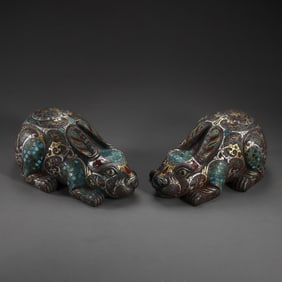 A pair of gem-encrusted rabbits from the Warring States period of China