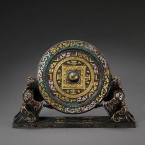 Bronze mirrors inlaid with gemstones during the Warring States period of China