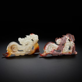 A pair of Chinese Han Dynasty white jade red Qin Longbi