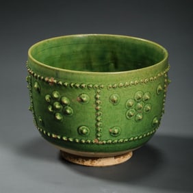 Chinese Sui Dynasty green glaze drum nail pattern cup