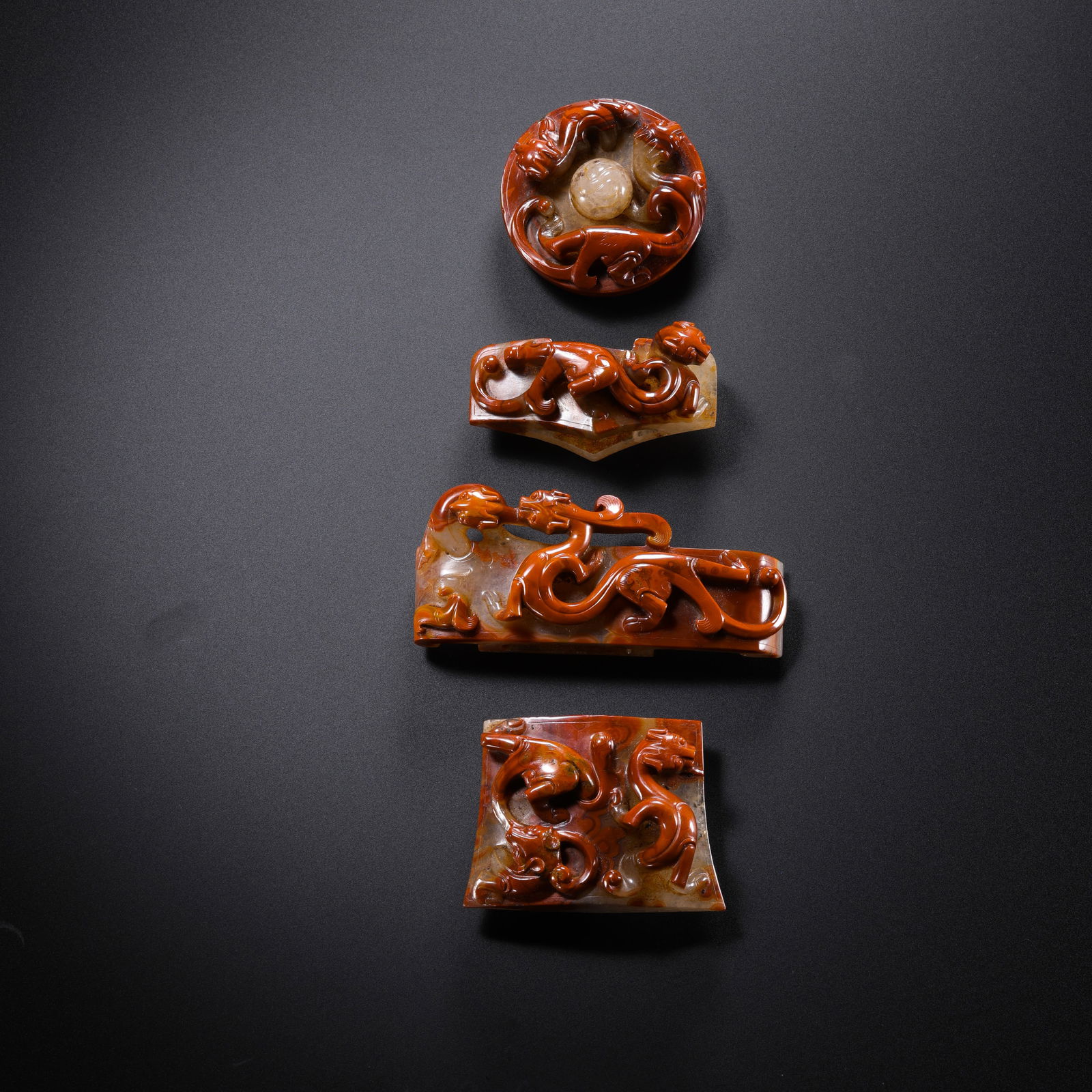 a group of Chinese Han Dynasty red onyx beautiful color dragon pattern sword (1 of 20)