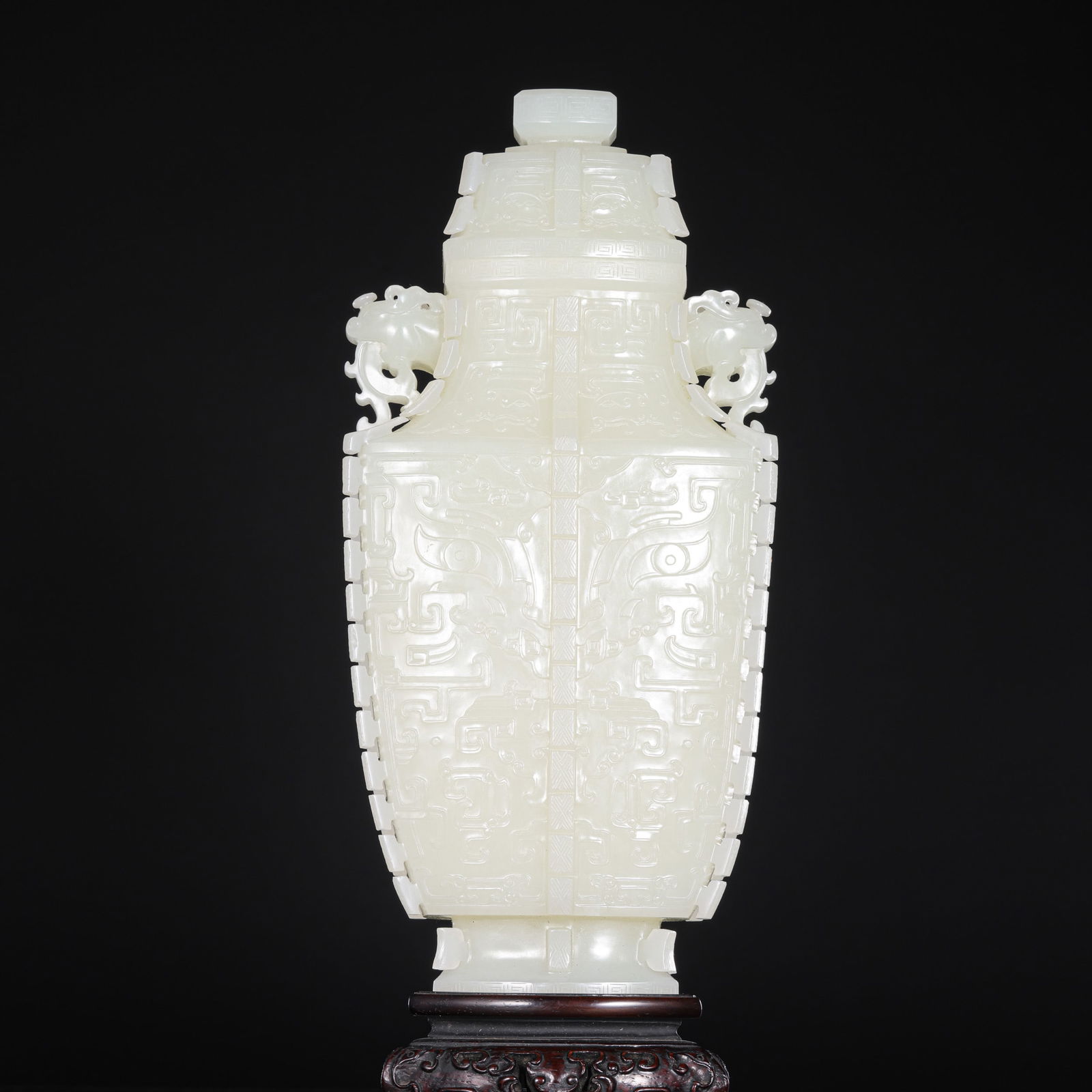 QING DYNASTY HETIAN WHITE NEPHRITE DOUBLE-RINGED FLASK WITH ANIMAL FACE PATTERN, CHINA: H. 22.5 cm. W. 10.5 cm. Weight 1011.5 gram.