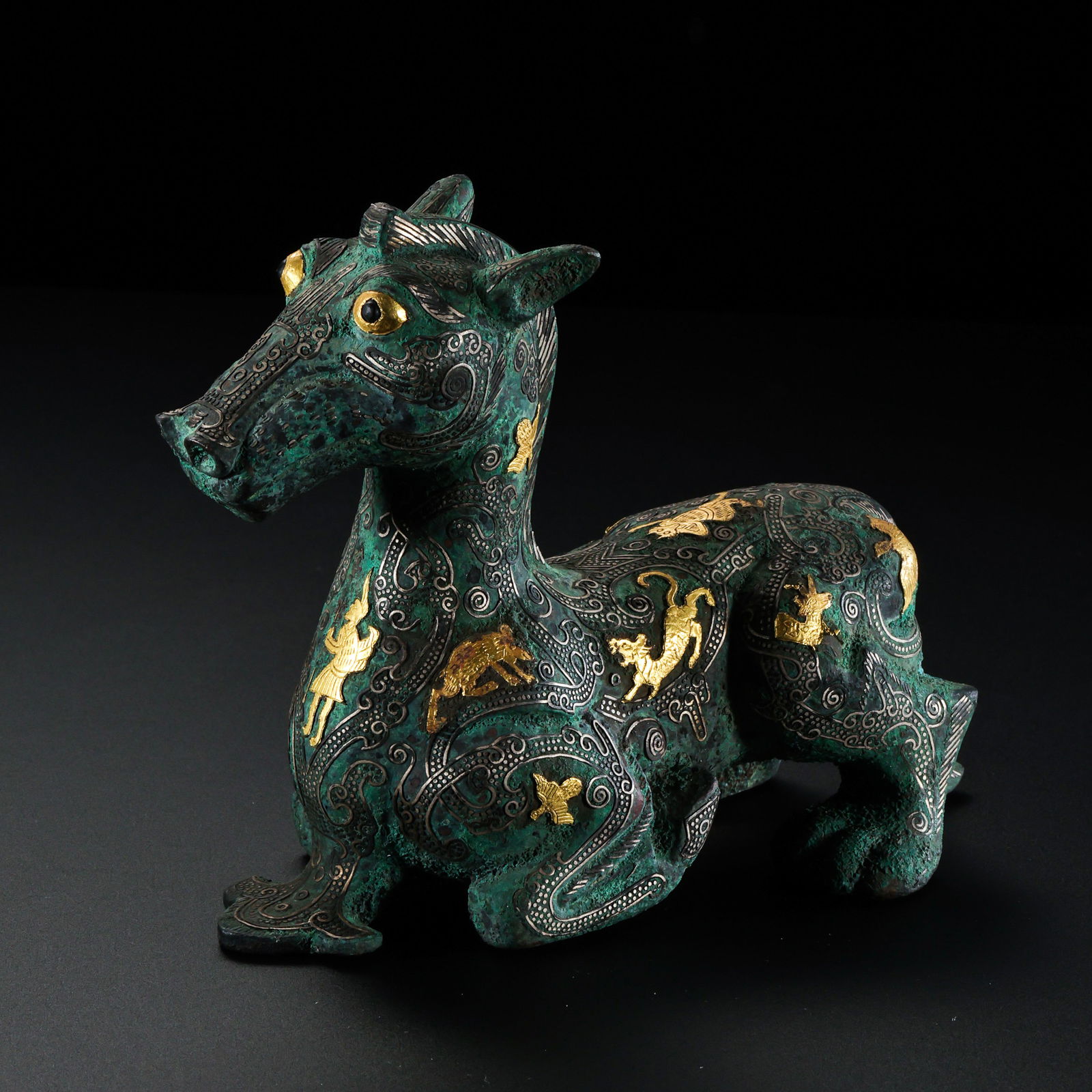 Gold and silver inlaid lying beast, Warring States Period, 5th to 3rd century BC (1 of 8)