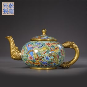 A Chinese gilt enamel double phoenix-patterned ewer from the Qianlong period of the Qing Dynasty