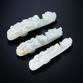 A set of Chinese Qing Dynasty Hetian white jade dragon belt hooks