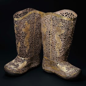 A pair of Chinese Liao Dynasty silver-gilt combat boots