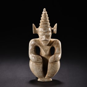 Chicken bone and white jade sun god statue of Hongshan culture in China during the Neolithic period