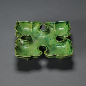Chinese Tang Dynasty green glaze flower mouth high foot plate