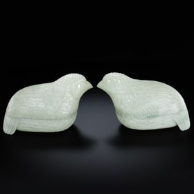 A pair of Chinese Qing Dynasty Hetian jade quail lidded boxes