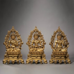 A Chinese Qing Dynasty Gilt Bronze and Turquoise Seated Figure of the Three Buddhas