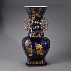 A Chinese Qing Dynasty blue and gold-painted double-handled vase