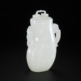 Chinese Qing Dynasty Hetian white jade animal-faced vase with ring ears