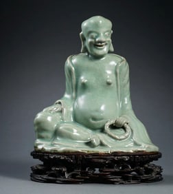Chinese Southern Song Dynasty Longquan kiln green glaze arhat seated figure