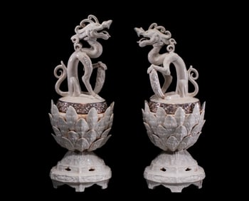 A pair of Chinese Song Dynasty lion-shaped incense burners