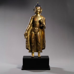 Chinese 15th century gilt-bronze standing Buddha