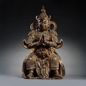 A Chinese Ming Dynasty Gilded Bronze Statue of the Seated Heavenly King