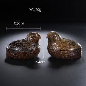 A pair of ancient Chinese Hetian jade quail lidded boxes