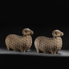 A pair of Chinese Tang Dynasty bluestone sheep vases