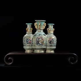 Chinese Qing Dynasty Qianlong period gilt powder enamel triple revolving vase