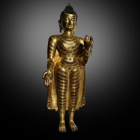 Chinese 15th century gilt-bronze standing Buddha