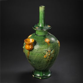 TANG DYNASTY THREE-COLOR PASTE PLASTIC FLOWER PATTERN BOTTLE (7-10 CENTURIES)