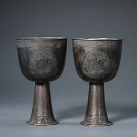 A PAIR OF QING DYNASTY STERLING SILVER GOBLETS