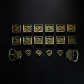 BEFORE THE MING DYNASTY A SET OF GILT BRONZE BELT PLATES