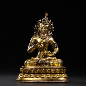 QING DYNASTY GILT BRONZE SEATED BUDDHA INLAID WITH PRECIOUS STONES