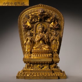 MING YONGLE, GILT BRONZE BUDDHA SITTING STATUE