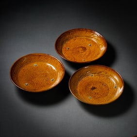 10-12 CENTURIES, A PROUP OF LIAO DYNASTY YELLOW GLAZE PLATES