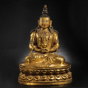 CHINESE MING DYNASTY GILT BRONZE SEATED BUDDHA