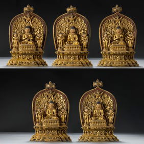 A GROUP OF CHINESE MING DYNASTY GILT-BRONZE SEATED BUDDHA FIGURES