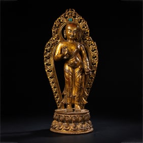 CHINESE MING DYNASTY GILT BRONZE STANDING BUDDHA