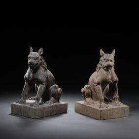 A PAIR OF CHINESE TANG DYNASTY STONE LIONS