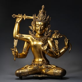 CHINESE MING DYNASTY GILDED BRONZE FOUR-ARMED GUANYIN