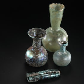 A GROUP OF CHINESE TANG DYNASTY COLORED GLAZE BOTTLES
