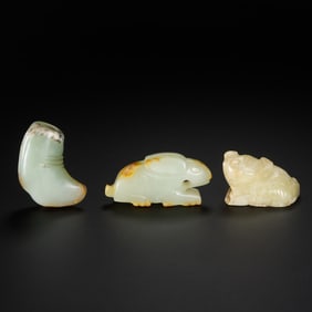 A GROUP OF CHINESE HAN DYNASTY JADE PIECES
