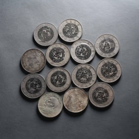 A SET OF CHINESE 20TH CENTURY PURE SILVER COINS