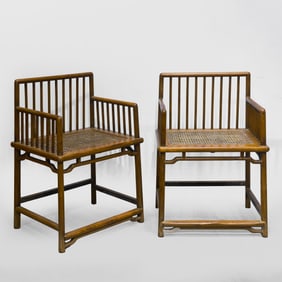 A PAIR OF CHINESE QING DYNASTY HUANGHUALI WOOD ARMCHAIRS