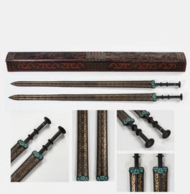 A SET OF CHINESE HAN DYNASTY WOODEN AND GOLD-PAINTED SWORDS