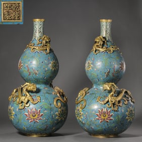 A PAIR OF CHINESE QING DYNASTY QIANLONG PERIOD CLOISONNé FLORAL GILT DRAGON GOURD VASES